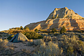 USA,  Utah,  Mt Carmel Primitive campsite beneath rock butte
