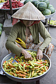 Vietnamese woman at the market at Cai Rang, Mekong Delta, Can Tho Province, Vietnam, Asia