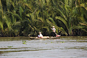 Vietnamese women on a boat on the Mekong River, Mekong Delta, Can Tho Province, Vietnam, Asia