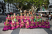 Girls in colourful costumes at the Madeira Wine Festival, Funchal, Madeira, Portugal