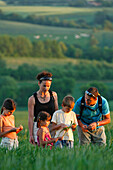 Gathering Ears Of Wheat, Family Promenade In The Wheat Fields And Bocages Of The Perche, Collines De Rougemont, Perche Near Nogent-Le-Rotrou, Eure-Et-Loir (28), France