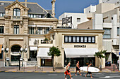 Surfer Passing In Front Of The Hermes Boutique, Basque Country, Basque Coast, Biarritz, Pyrenees Atlantiques, (64), France