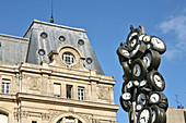 Facade Of The Gare Saint Lazare Train Station And Sculpture 'The Clocks' By The Artist Arman, Paris, France