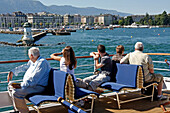 Touring On A Cruise Boat On Lake Geneva In Front Of The City Of Geneva, Switzerland