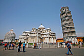 The Leaning Tower (Torre Pendente), Baptistery (Battistero) And Cathedral (Duomo) On The Campo Dei Miracoli, Pisa, Tuscany, Italy