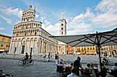 The San Michele In Foro Church Square And Sidewalk Cafe, Lucca, Tuscany, Italy