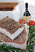 'Lardo Di Colonnata, Colonnata Lard, Coming From A Small Valley Not Far From Carrare. Of A Rectangular Shape (Never Less Than 3 Centimeters Thick), It Is A Lard That Will Marinate In Salt And Spices; The Lower Part Holds The Rind While The Upper Part Is C