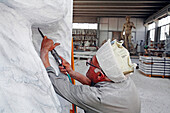 Sculptor Working On White Marble Extracted From The Michelangelo Quarry, Sculpture Workshop Of The Barattini Company, Cave Michelangelo, Carrara, Tuscany, Italy