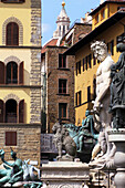 Tourists In Front Of The Statue Of Neptune By Ammannati, Piazza Della Signoria, Florence, Tuscany, Italy
