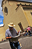 Man Reading His Paper, Santo Spirito Church, Florence, Tuscany, Italy