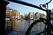 Bicycle Along The Amstel Canal In The Center Of Amsterdam, Netherlands