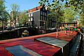 Houseboat On The Kloveniersburgwal Canal, Amsterdam, Netherlands
