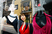 Portuguese Clothes Designer Fatima Lopes In Her Boutique Rua Da Atalaia And Reflection Of Houses' Facades, Bairro Alto, Lisbon, Portugal, Europe