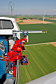 Firefighters In Action For Evacuation Of A Victim By The Exterior With A Rope Boat In Horizontal Position, Rescue On The Hub Of The Generator Of A Wind Turbine With The Departmental Team Of The Grimp, Town Of Poinville, Eure-Et-Loir (28), France