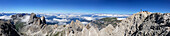 Panorama of Rosengarten group, mountaineers on mount Kesselkogel, Dolomites, Trentino-Alto Adige/South Tyrol, Italy