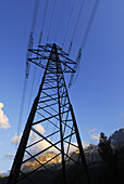 Electricity  pylon in front of mountain scenery, Canton of Ticino, Switzerland