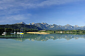 Lake Forggensee with sailboats, Fuessen, Allgaeuer Alps, Bavaria, Germany