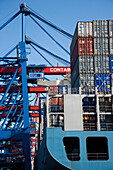 Cargo ship at container gantry crane, Port of Hamburg, Germany
