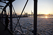 Frozen river Elbe in sunset, Hamburg, Germany