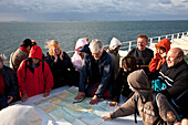 Tour group on ferry, Foehr, Schleswig-Holstein, Germany