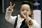 Portrait of a little Chinese boy, Xiamen, Fujian, China, Asia