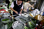 People cooking at a noodle  cook shop at Tainan, Republic of China, Taiwan, Asia