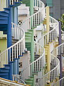 Spiral staircases as exit ways in the back of houses in the city_state of Singapore