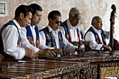 Musicians playing the marimba,  Antigua Guatemala,  Sacatepequez department,  Guatemala