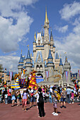 Crowd in front of Cinderella Castle at Walt Disney Magic Kingdom Theme Park Orlando Florida Central