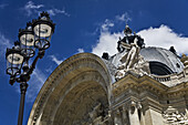 The facade of the Petit Palais,  the home of the City of Paris Museum of Fine Arts musée des beaux-arts de la ville de Paris,  with a 3 lamp street lamp in the foreground,  Avenue Winston Churchill,  Paris,  Ile de France,  France
