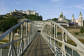 Mozartsteg bridge,  Festung Hohensalzburg and the Residenz,  Salzburg,  Austria