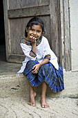 Guatemala,  Rio Dulce,  girl on porch