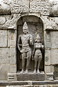 8th century Rati and Manmatha sculptures Pallava period on the parapet wall back of temple Vimana in Sundaravarada Perumal temple in Uttiramerur,  Tamil Nadu,  India