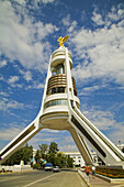 Arch of Neutrality with 12m high gold statue of Niyazov which revolves to follow the sun throughout the day,  Ashkabad,  Turkmenistan