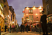 Ireland,  Dublin,  Temple Bar,  street scene at night,  men dressed like zombie,  I think!!