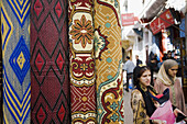 Carpets,  on background view of the medina in Sale,  near Rabat,  Morocco.