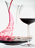 wine glass and carafe with red wine