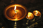 Brass butter candles at Tiksey Gompa Tiksey,  Ladakh,  India