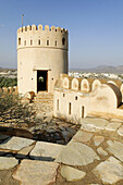 historic adobe fortification Nakhal,  Nakhl Fort or Castle,  Hajar al Gharbi Mountains,  Batinah Region,  Sultanate of Oman,  Arabia,  Middle East