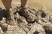 Muddy feet after canyon hiking along the Green River,  Canyonlands National Park,  Utah