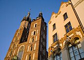 Poland Krakow St Mary´s Church with the Art Nouveau Czynciel´s House at Main Market Square