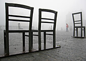 Poland,  Krakow,  Podgorze district,  Memorial to the heroes of the Krakow ghetto,  metal chairs