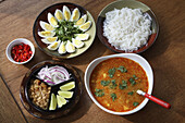 Myanmar,  Burmese Mohinga fish soup with side dishes