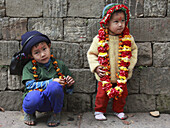 Nepal,  Kathmandu Valley,  Dashinkali,  children with flowers