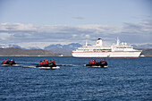 Passengers of cruise ship MS Deutschland in rubber dinghies, Kitaa, Greenland