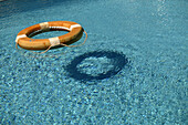 Life ring floating in a swimming pool, Safety