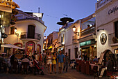Guests in restaurants in Old Town in the evening, Nerja, Andalusia, Spain