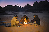 Tuaregs drinking tea at campfire, Tassili Maridet, Libya, Sahara, Africa