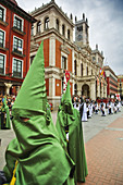 Holy Week procession passing by the Town Hall in Main Square, Valladolid. Castilla-Leon, Spain