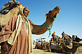 Tourists riding camels, Sahara Desert, Douz, Tunisia